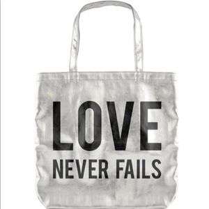 Silver Metallic Love Never Fails Tote Bag